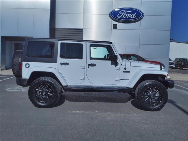 Used 2016 Jeep Wrangler Unlimited Freedom Edition with VIN 1C4BJWDG3GL192359 for sale in Annandale, Minnesota